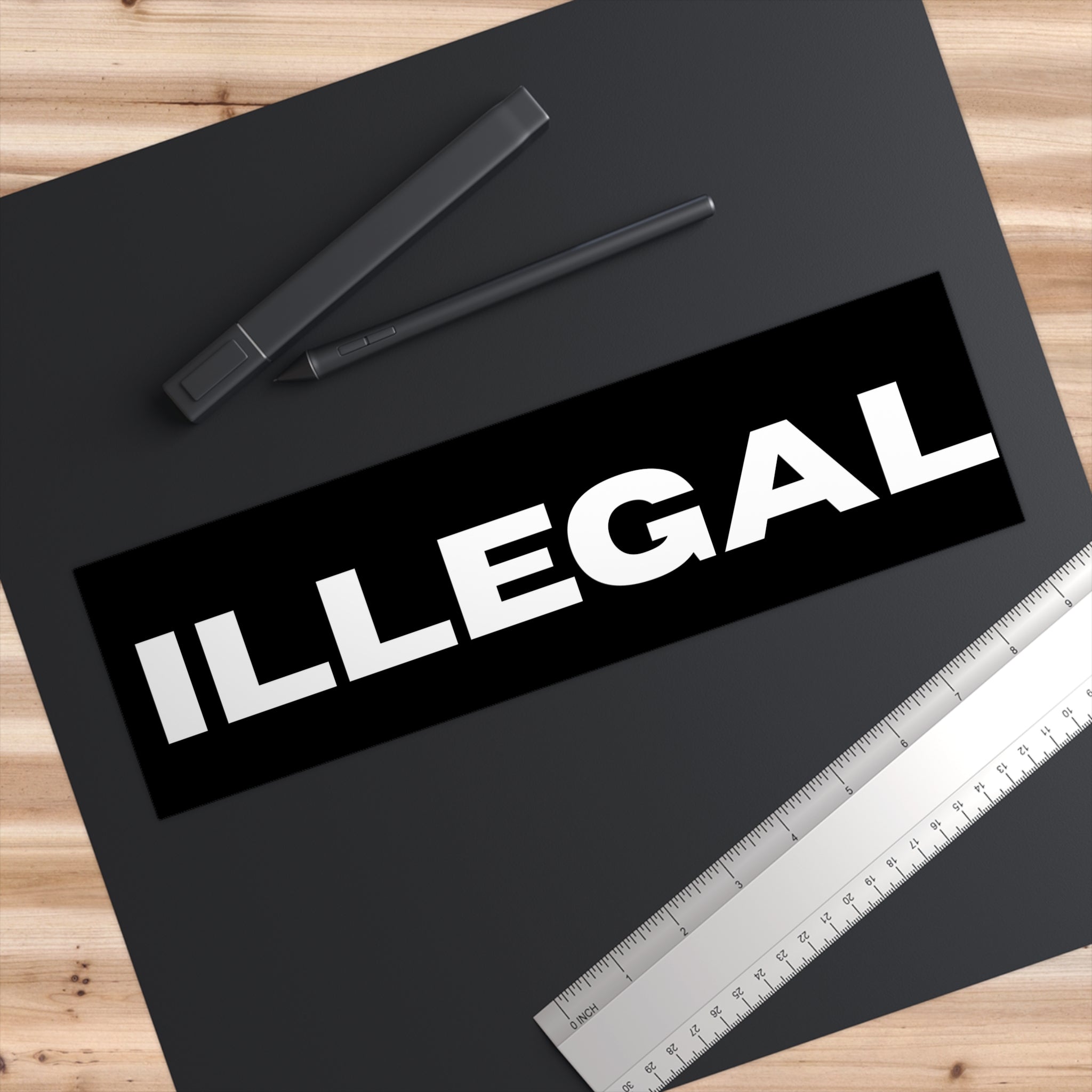 ILLEGAL bumper sticker | Black rectangle decal, bold white text